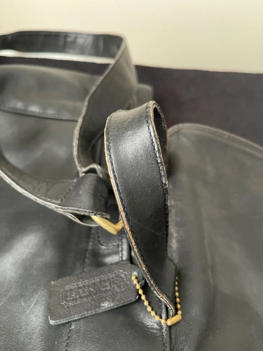 Coach Black Leather Drawstring Backpack with Front Zip Pocket